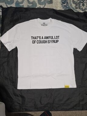 White Graphic Tee with 'That's A Awful Lot Of Cough Syrup' Text